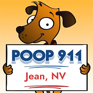 POOP 911 Jean, Nevada yard sign being held by a Smiling Brown Dog.