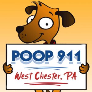 West Chester pooper scooper service POOP 911 yard sign being held by a happy brown dog.